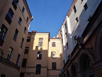 Low angle view of residential buildings against sky