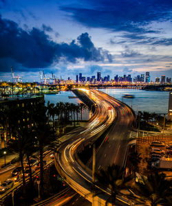 High angle view of light trails on highway at night