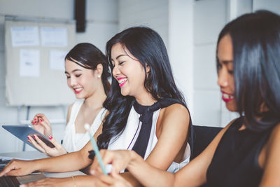 Young woman using smart phone