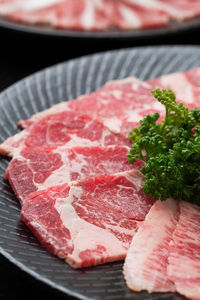 Close-up of meat in plate on table