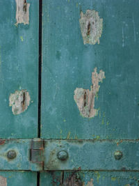 Full frame shot of old rusty metal door