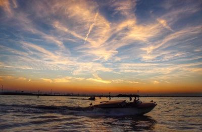 Scenic view of sea at sunset