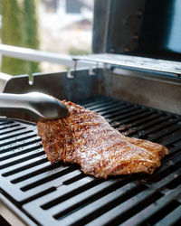 Close-up of meat on barbecue grill