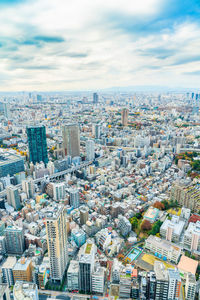 High angle view of city buildings against sky