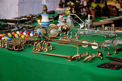 Close-up of objects on table at market stall