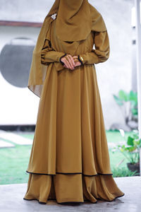 Muslimah abaya gown in olive color fabrics