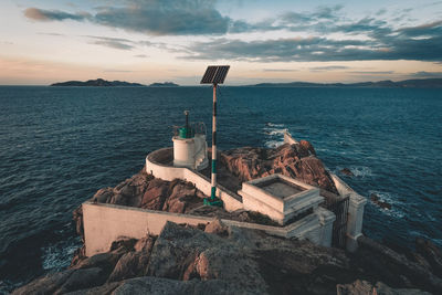 High angle view of lighthouse against sea and sky