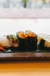 Close-up of sushi in plate on table