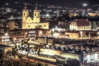 High angle view of illuminated buildings in city