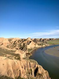 Scenic view of rock formations against sky