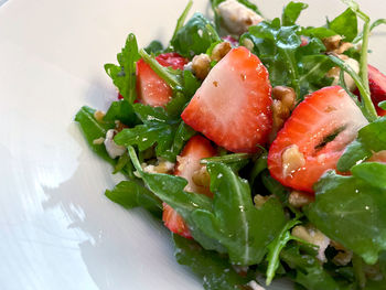 Close-up of chopped fruit salad in plate