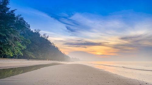Scenic view of road against sky during sunset