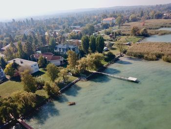 High angle view of river amidst buildings in city