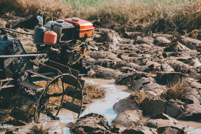 View of machine on muddy land