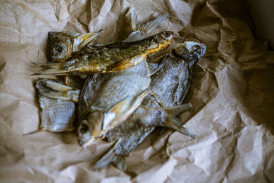 Dried fish on paper