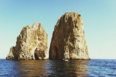 Panoramic view of sea against clear sky