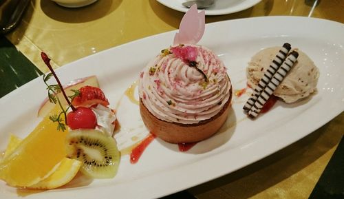Close-up of dessert served on table