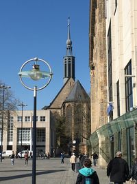 Low angle view of building against blue sky