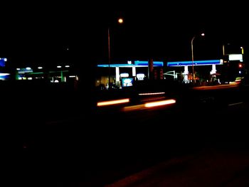 Cars on street at night