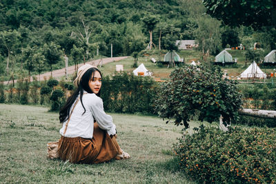 Portrait of beautiful woman in park