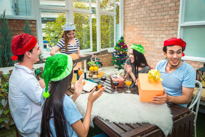 Friends enjoying party at restaurant