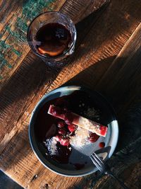 High angle view of wine in glass on table
