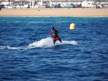 Man surfing in sea