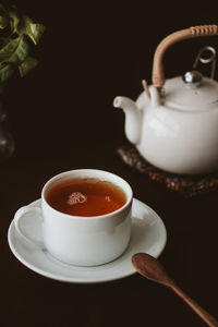 Close-up of tea cup on table