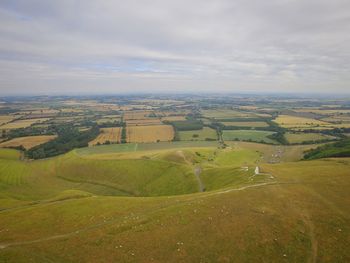 Aerial view of agricultural landscape against sky