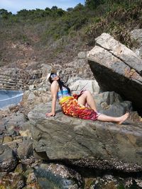 Sunbathing rock mountain bikini 