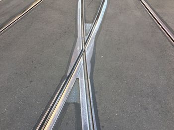 High angle view of railroad tracks on road