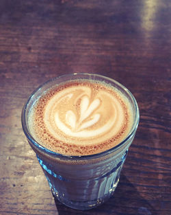 High angle view of cappuccino on table