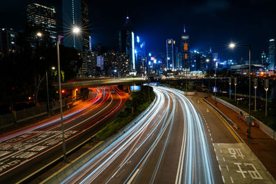 High angle view of light trails on road at night