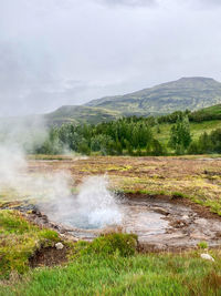 A steaming hot spring in the nature of iceland