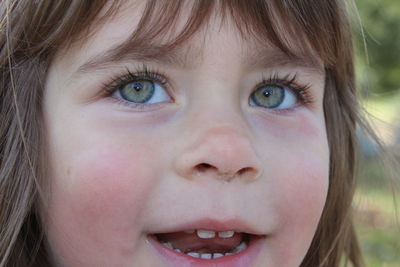 Close-up portrait of smiling boy