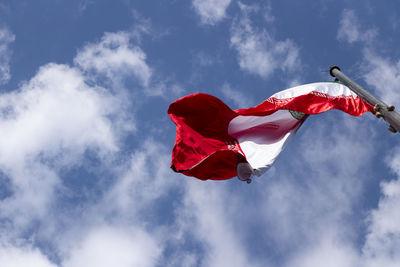 Low angle view of flag against sky