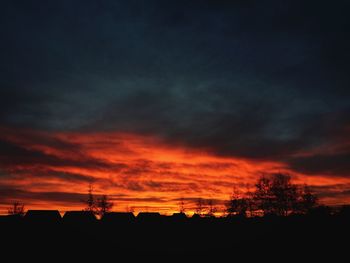 Low angle view of cloudy sky at sunset