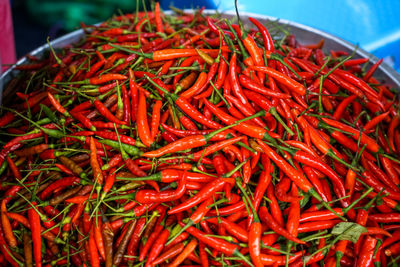 High angle view of red chili peppers for sale in market