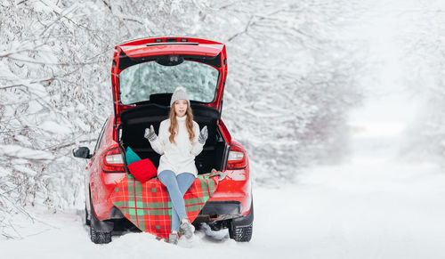 Woman sitting in car