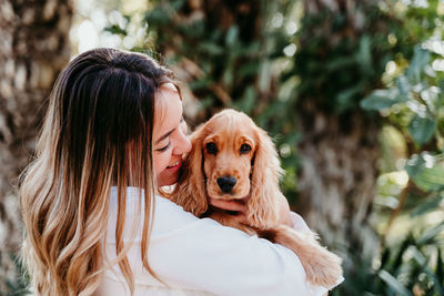 Woman with dog at park