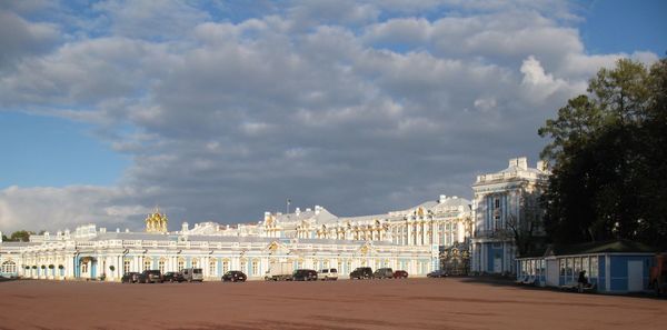 Buildings by beach against sky in city