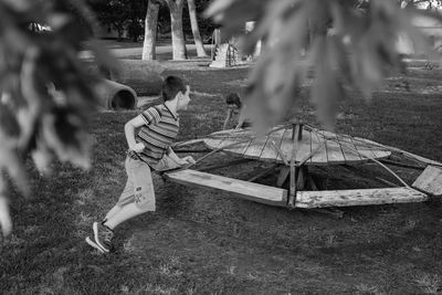 Children by play equipment at playground