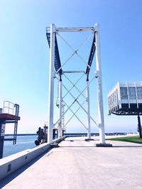 View of bridge against clear blue sky