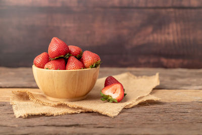 Close-up of strawberries in bowl on table