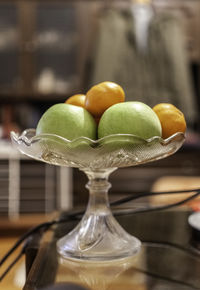 Close-up of oranges on table