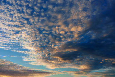 Low angle view of dramatic sky during sunset