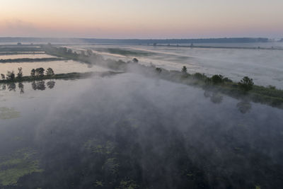 Aerial view of the dawn with fog in the fishponds, crna mlaka, croatia