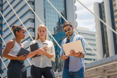 Group of people standing in front of building