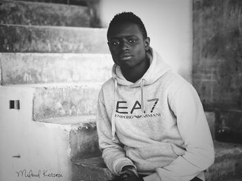Portrait of young man looking at camera