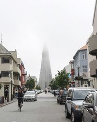 Rear view of woman walking in city